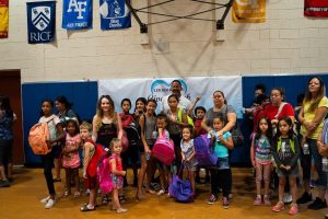 Kevin Rowe Group Photo with Families | 2019 Phoenix Backpack Giveaway