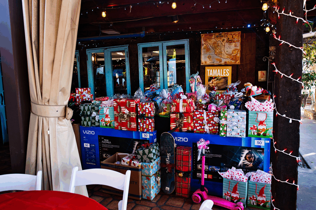 Gift table at 2025McKenna Youth Foundation's Annual Children's Holiday Party