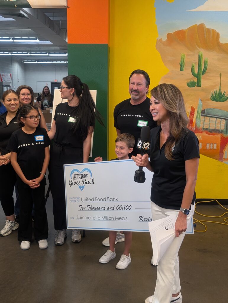 Kevin and Brixton Rowe with team members 