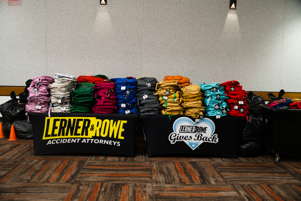 Lerner and Rowe filled backpacks at Tucson Backpack Giveaway 2026