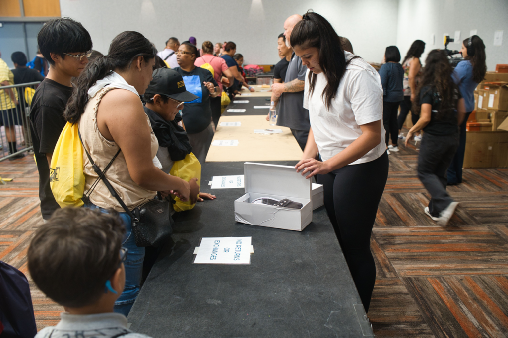 Tucson schools at backpack giveaway